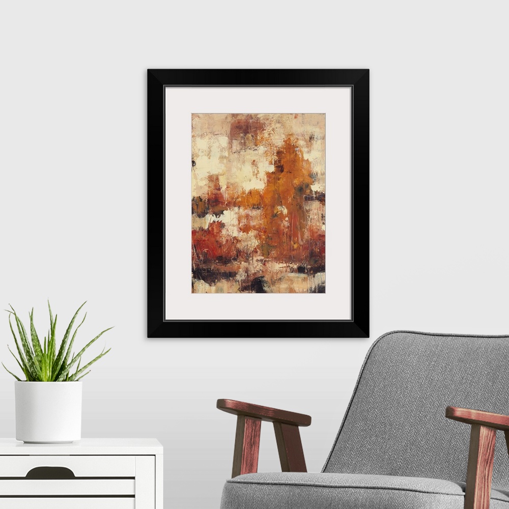 A modern room featuring Abstract artwork that uses autumn colors splashed onto a neutral background with a distressed look.