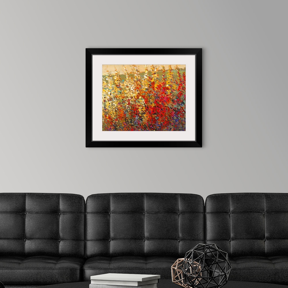 A modern room featuring A glorious tangle of wildflowers in warm yellow and red tones. This modern painting in the impres...
