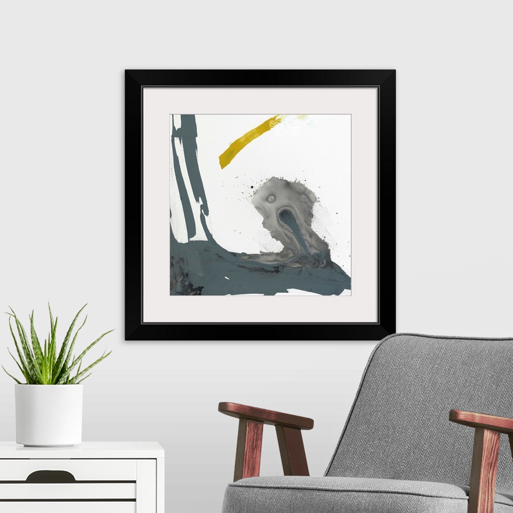 A modern room featuring Abstract painting using aggressive strokes of gray with a hint of yellow against a white background.