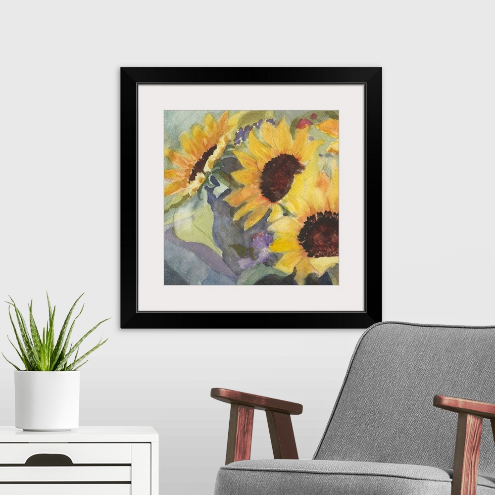 A modern room featuring Square watercolor painting of large sunflower blooms.