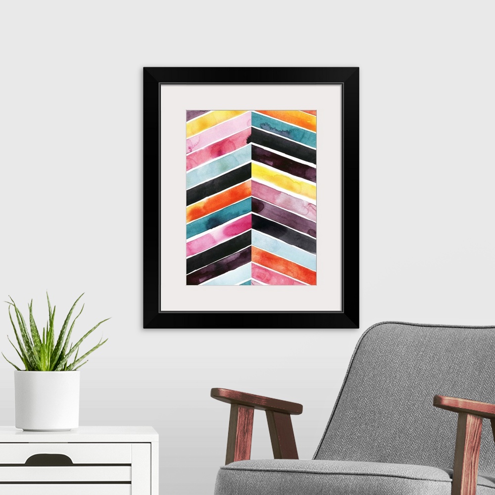 A modern room featuring Chevron striped watercolor painting in vivid red, pink, blue, and yellow contrasting with black.