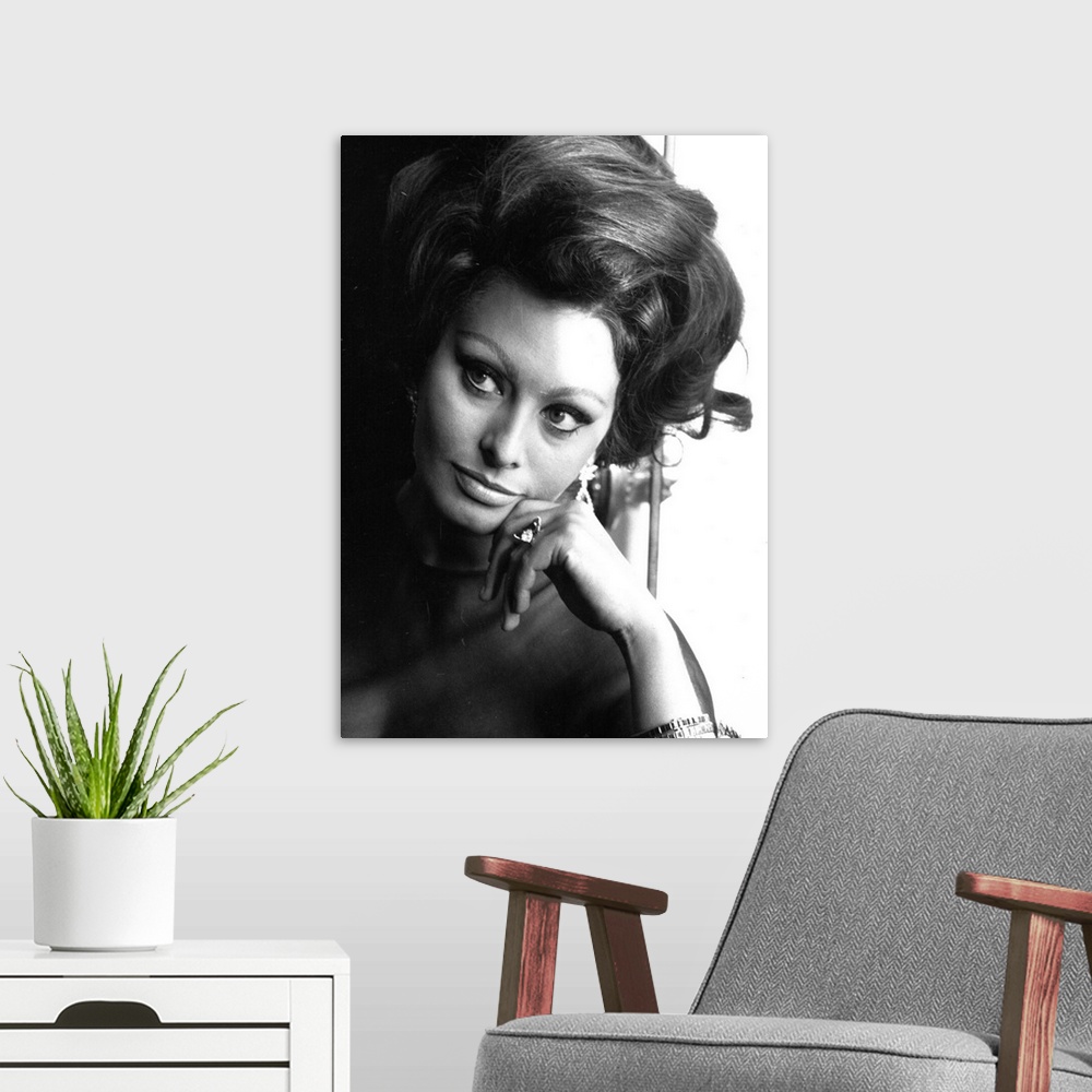 A modern room featuring Italian film actress, Sophia Loren at a photocall