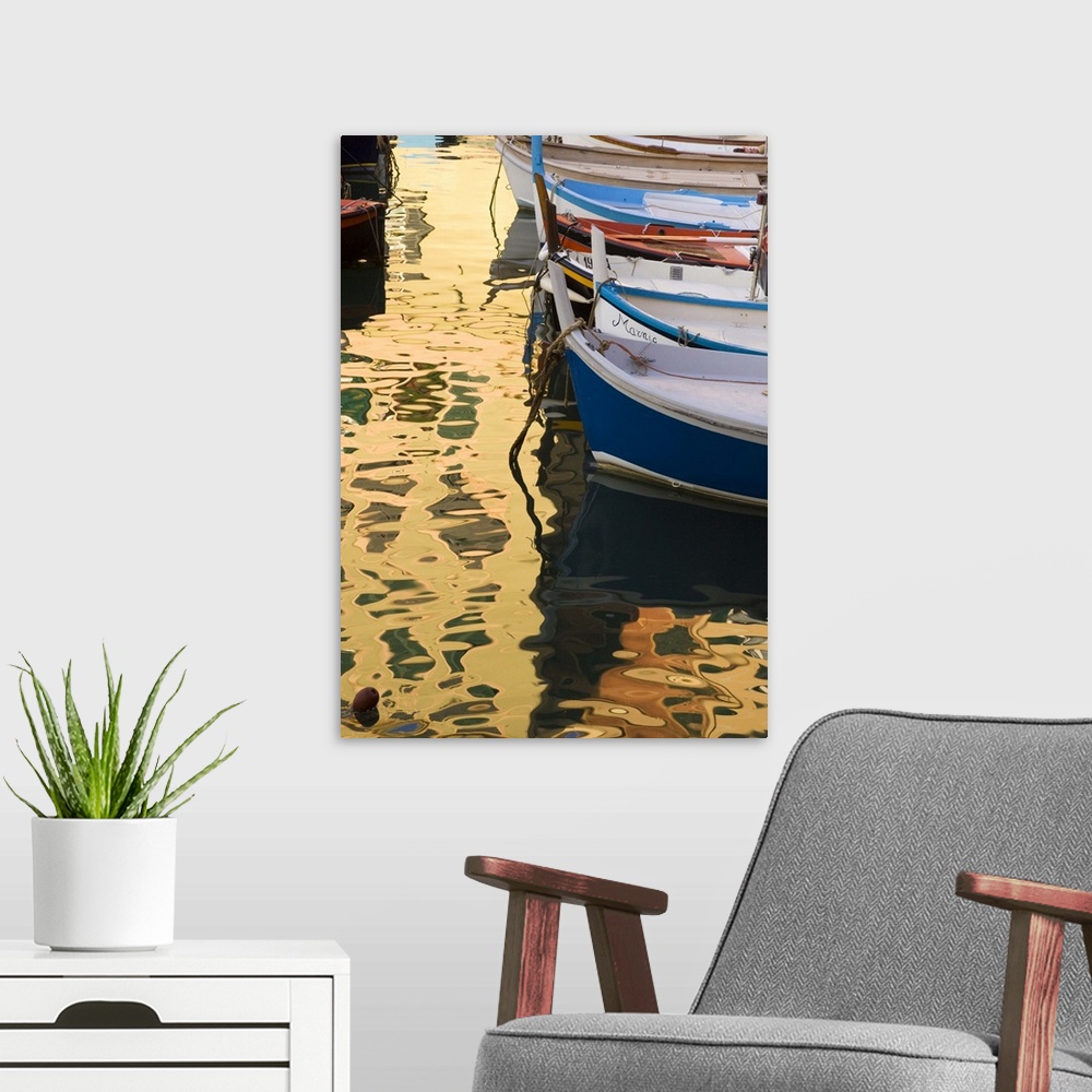 A modern room featuring Europe, Italy, Camogli. Boats and buildings form abstract reflections on water.