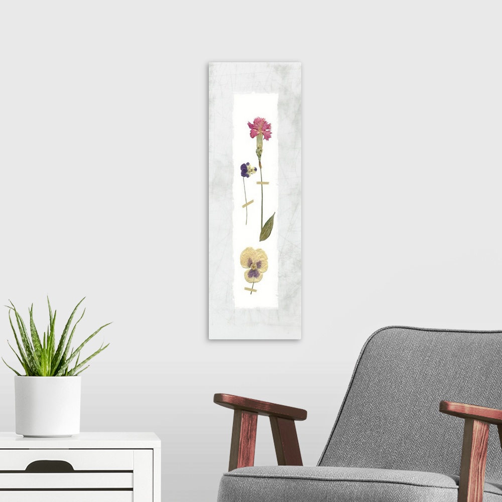A modern room featuring Panel decor with dried flowers pressed onto a painted white rectangle on a marble-like background.