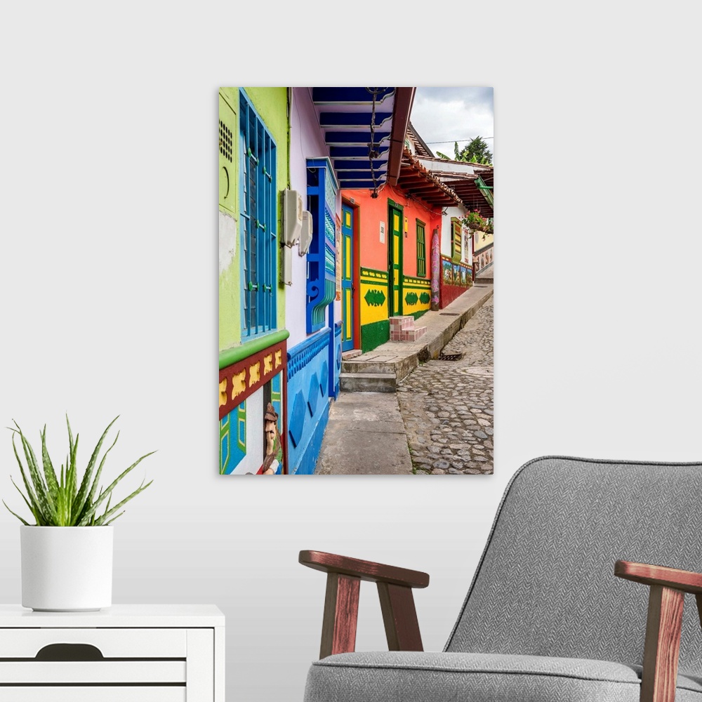 A modern room featuring Colourful Street of Guatape, Antioquia Department, Colombia.
