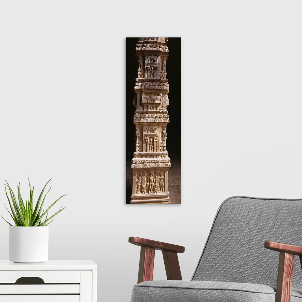 A modern room featuring Sculptures carved on a column, Tamil Nadu, India