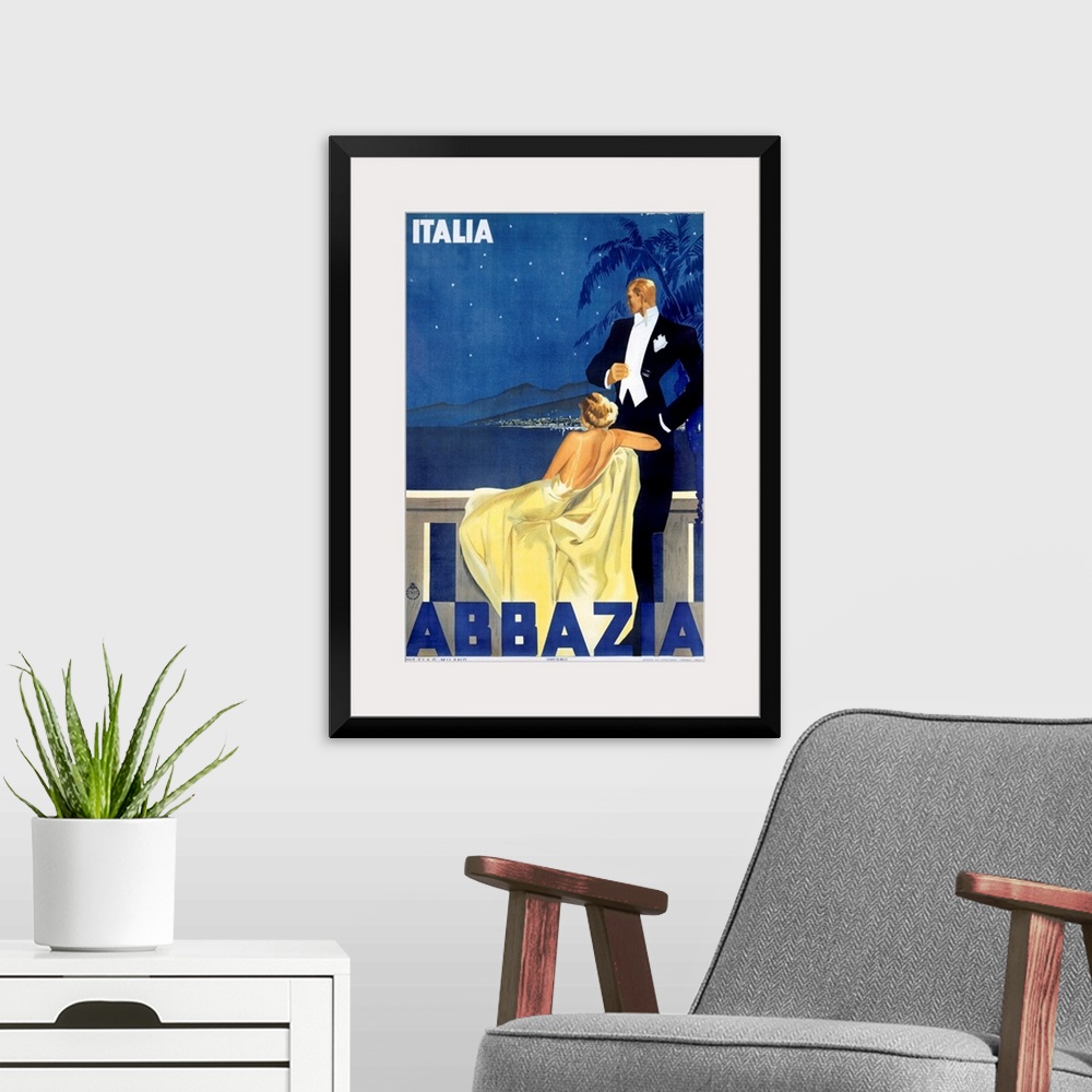 A modern room featuring Antique advertising poster showcasing hotel in Venice.  A woman dressed in an evening gown and a ...