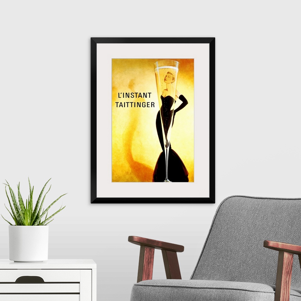 A modern room featuring Big print of a slender champagne filled glass with a woman posing seen through it.