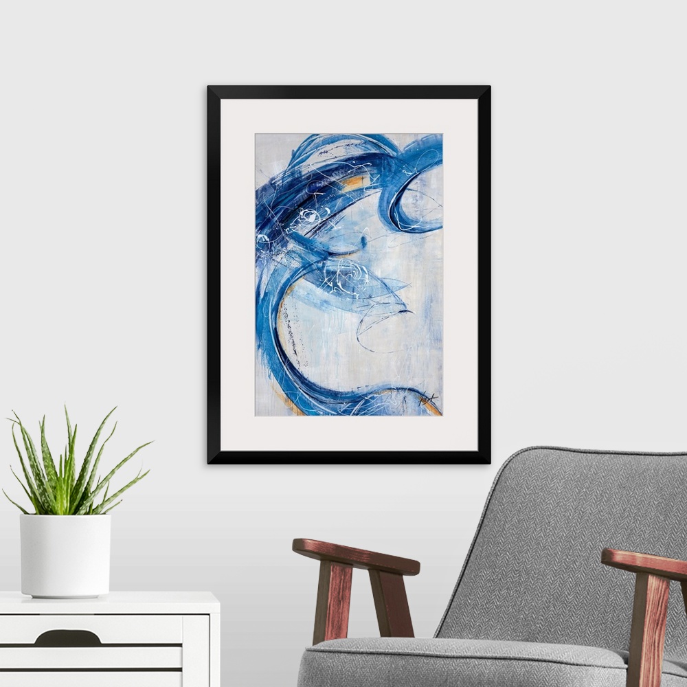 A modern room featuring Contemporary painting of energetic blue brushstrokes that sweep over this vertical composition an...