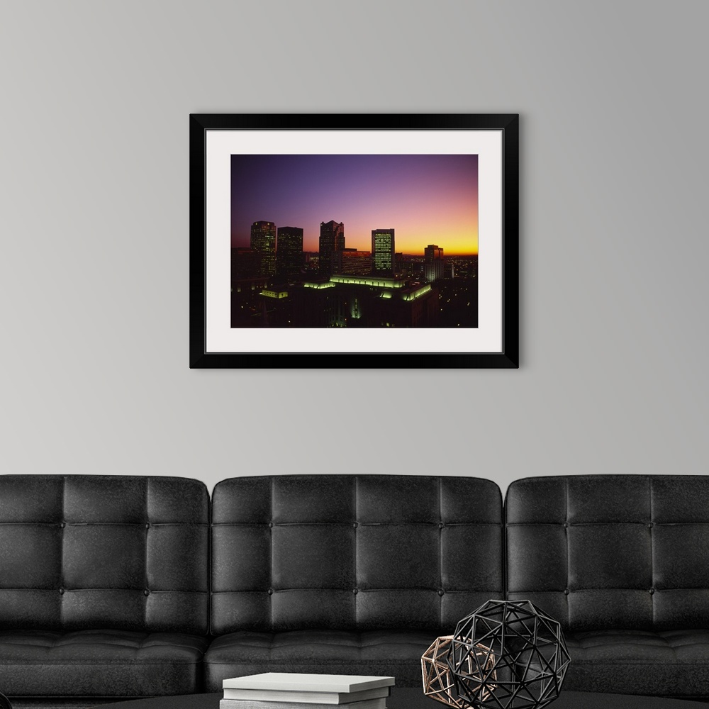 A modern room featuring Buildings in a city at dusk, Birmingham, Alabama,