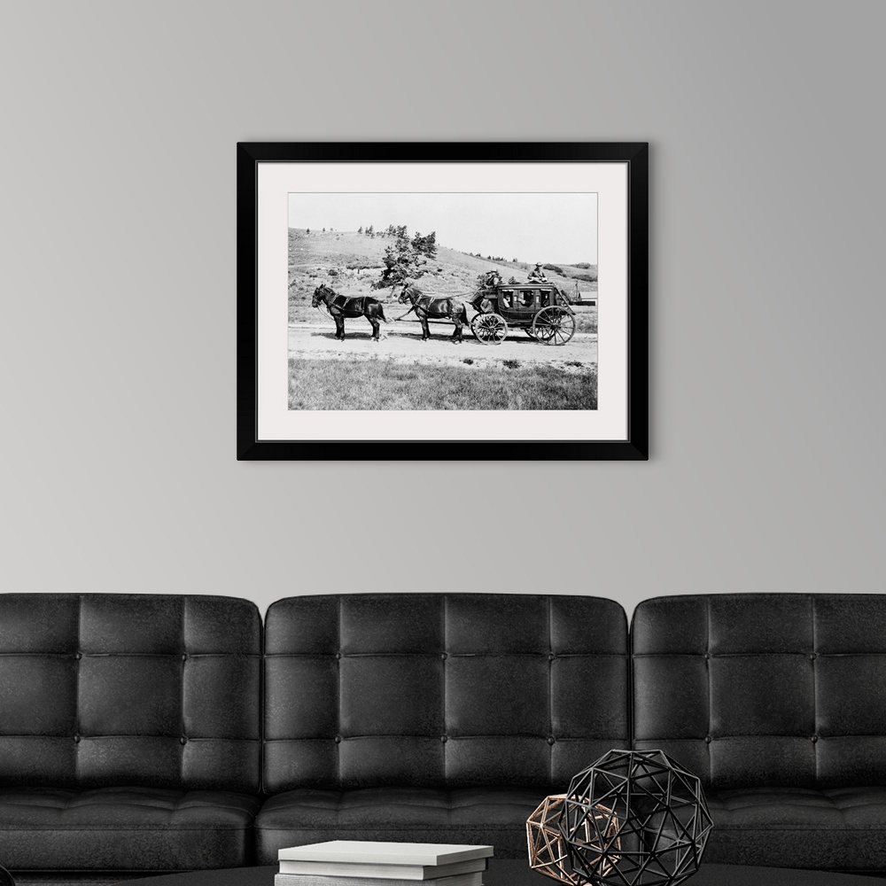 A modern room featuring Yellowstone, Stagecoach, C1913. An Old Horse Drawn Stagecoach In Yellowstone National Park, Wyomi...