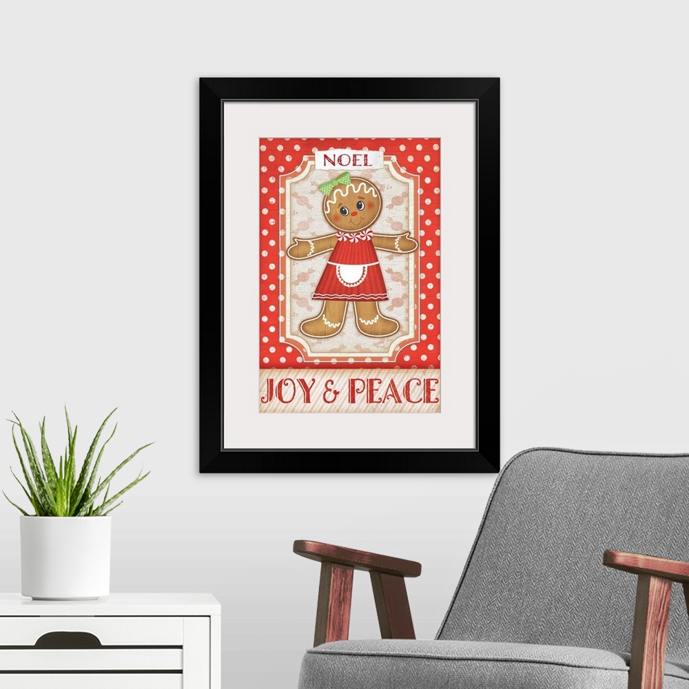 A modern room featuring Holiday themed home decor artwork of a gingerbread girl against a red and white polka dotted back...