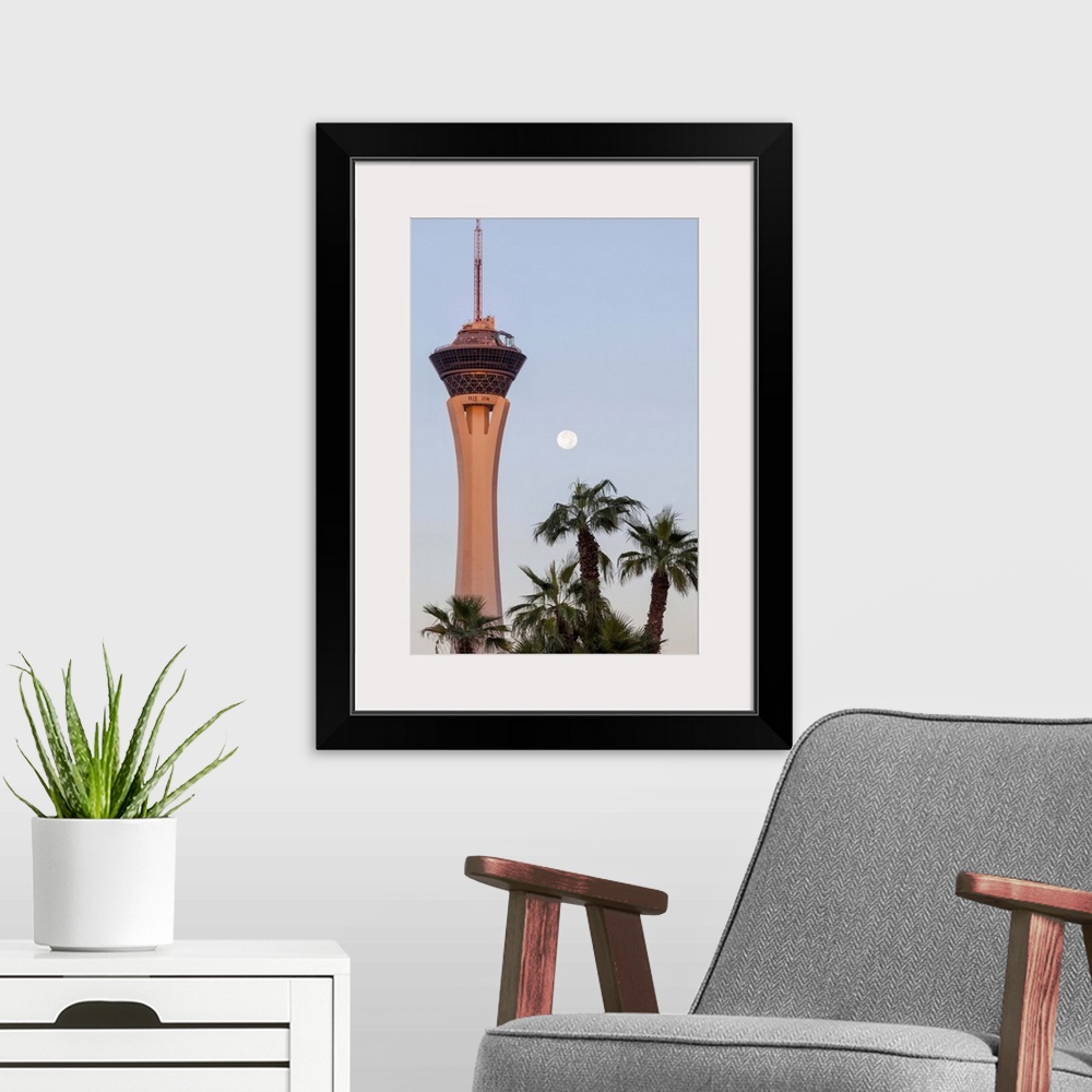 A modern room featuring USA, Nevada, Las Vegas, Stratosphere Tower at dawn.