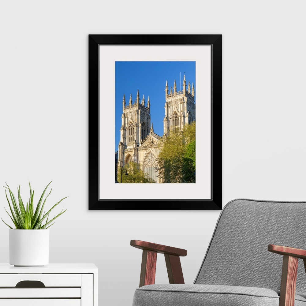 A modern room featuring United Kingdom, England, North Yorkshire, York. The Minster on a Spring evening.