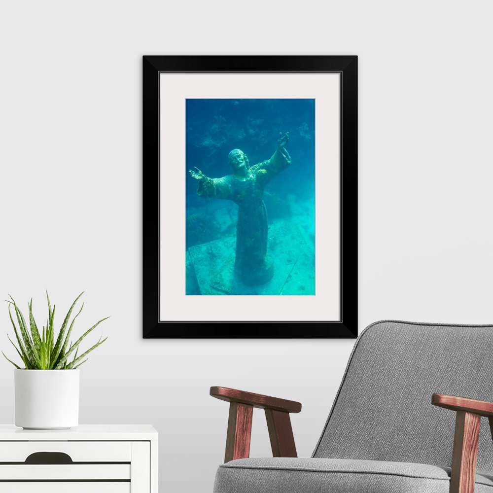 A modern room featuring Christ of the Deep statue in a coral reef state park in the Keys.