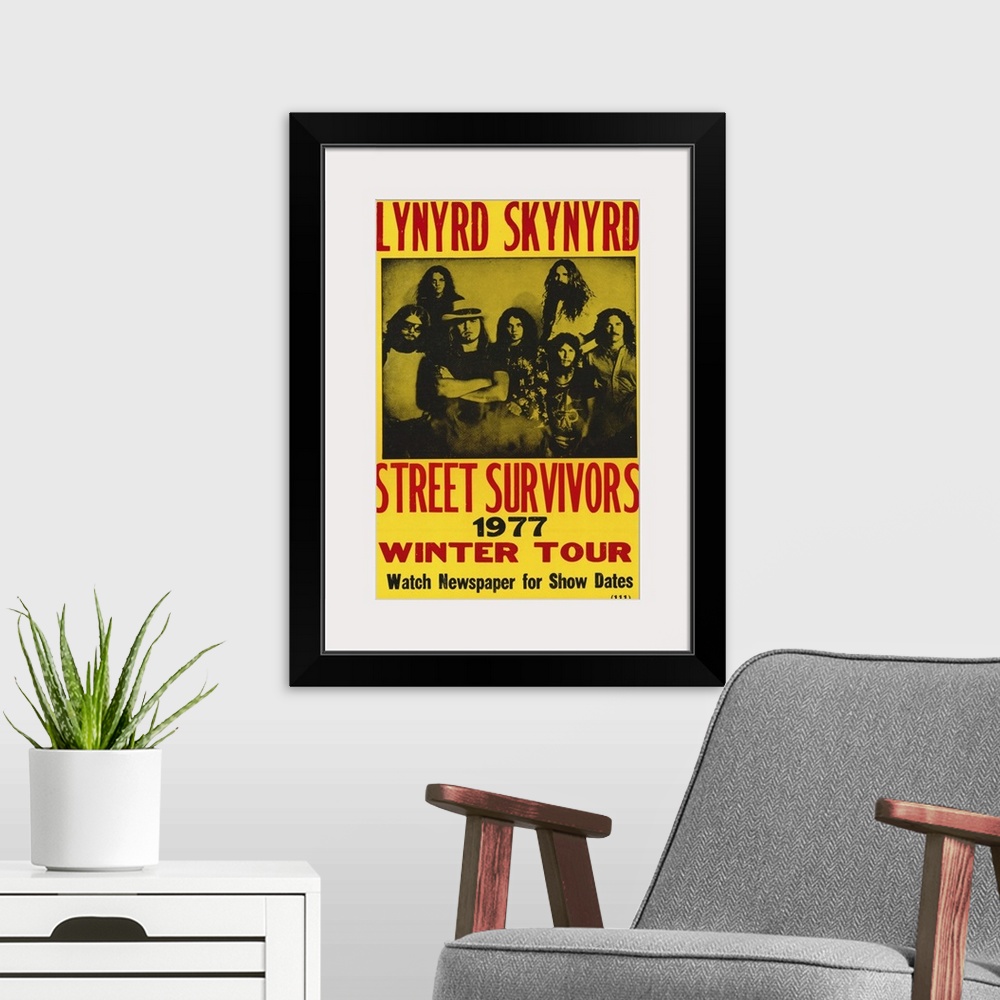 A modern room featuring Vintage poster for American rock band's tour "Street Survivors."  The band was popular for promot...