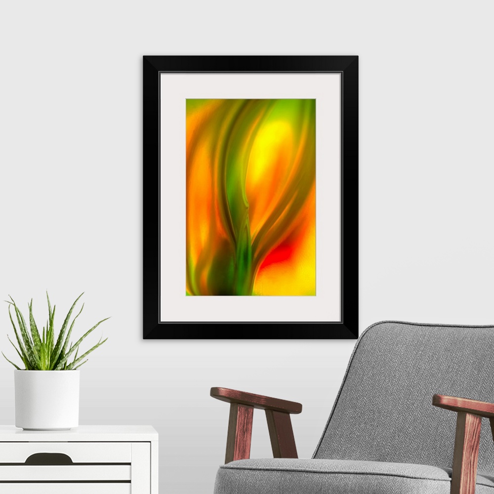 A modern room featuring Vertical, fine art, close up photograph of a vibrant tulip, the image is very soft and fluid with...