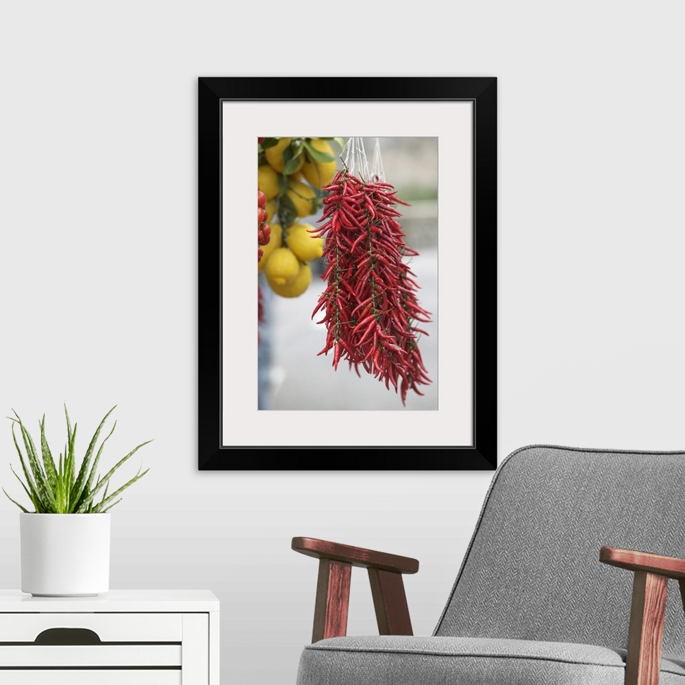 A modern room featuring Close-up of lemons and red chili peppers, Positano, Amalfi Coast, Campania, Italy