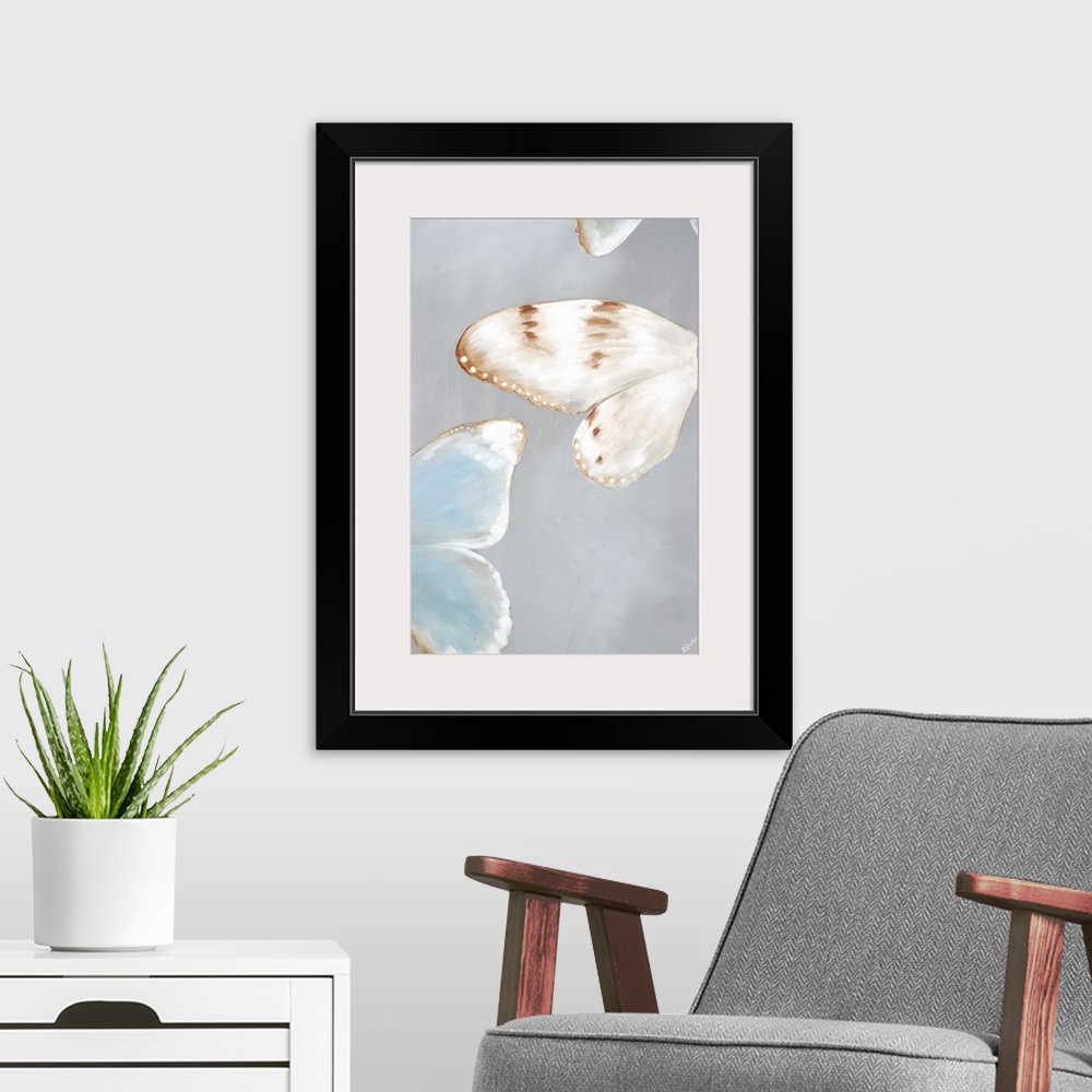 A modern room featuring Contemporary abstract painting of pale colored butterflies against a gray background.
