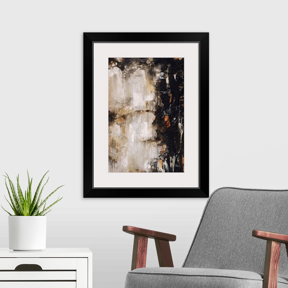 A modern room featuring Abstract painting of deep black and rich earth tones clashing toward the center of the image.