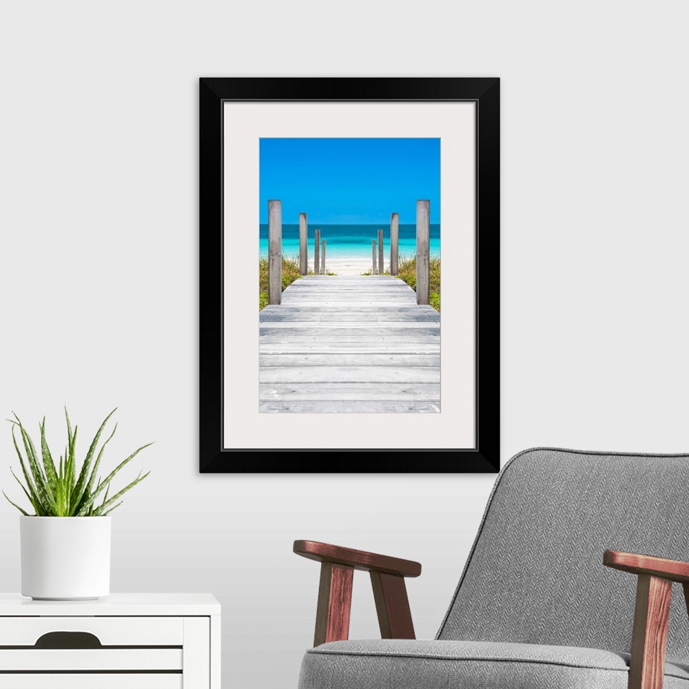 A modern room featuring Photograph of a wooden boardwalk leading straight to the crystal blue ocean in Cuba.