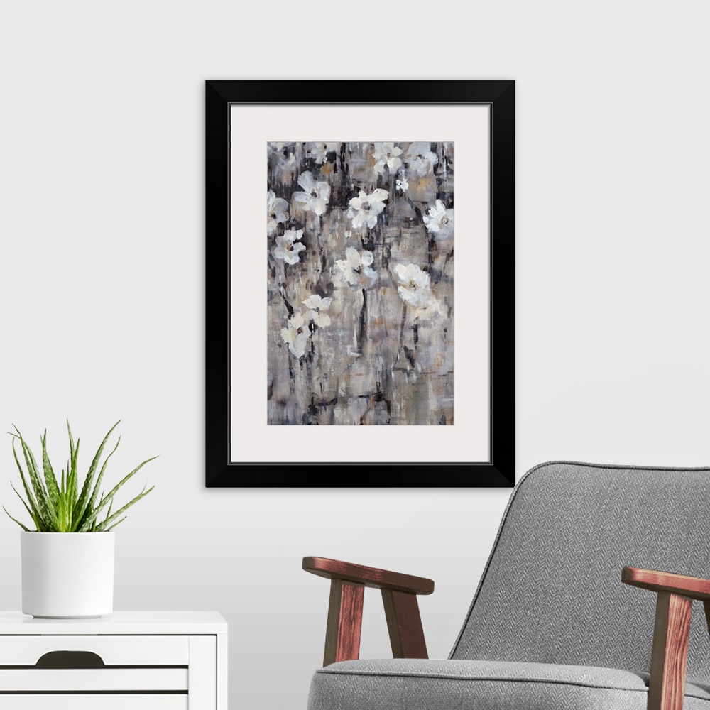 A modern room featuring Contemporary painting of gray-toned florals.