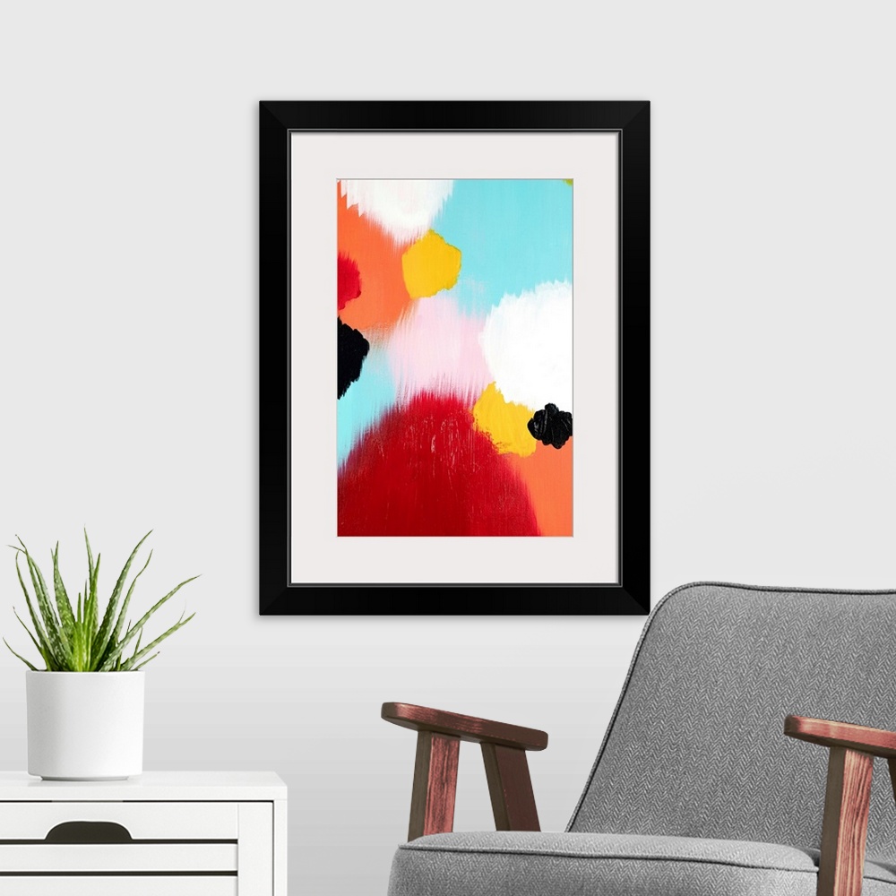 A modern room featuring Abstract painting of soft, large circles in bright colors.