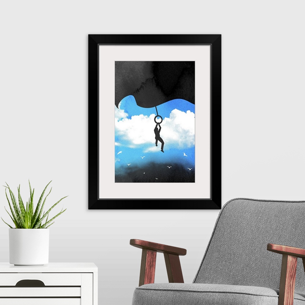 A modern room featuring Vertical art on a big canvas of the silhouette of a man hanging from a small loop attached to the...