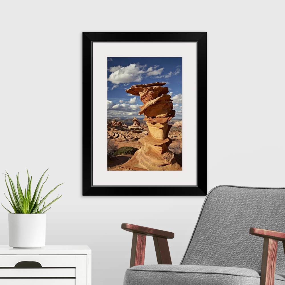 A modern room featuring Layered sandstone column under clouds, Coyote Buttes Wilderness, Vermillion Cliffs National Monum...