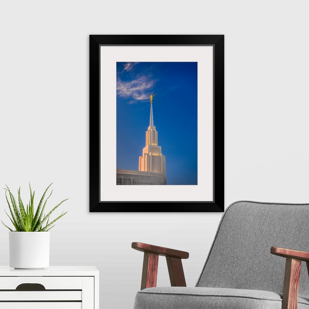 A modern room featuring The Twin Falls Idaho Temple is located near Snake River Canyon. The spire on top of the temple, w...
