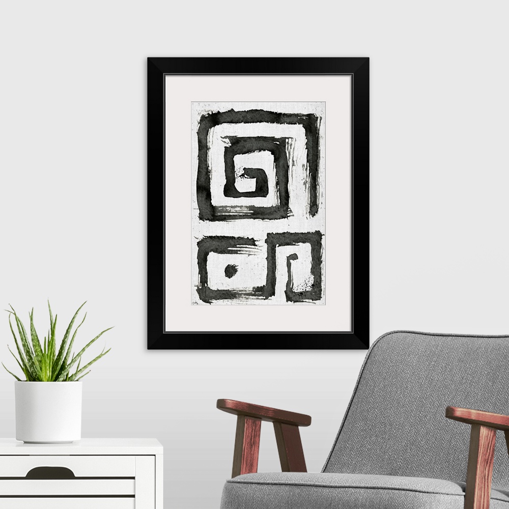 A modern room featuring Black and white abstract painting of boxy tribal swirls.