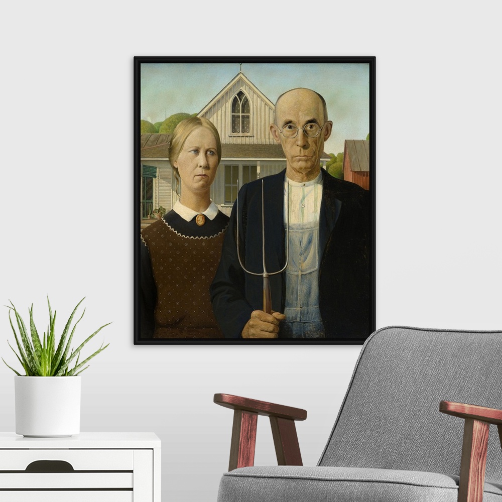 A modern room featuring American Gothic, 1930 (originally oil on beaver board) by Wood, Grant (1891-1942).