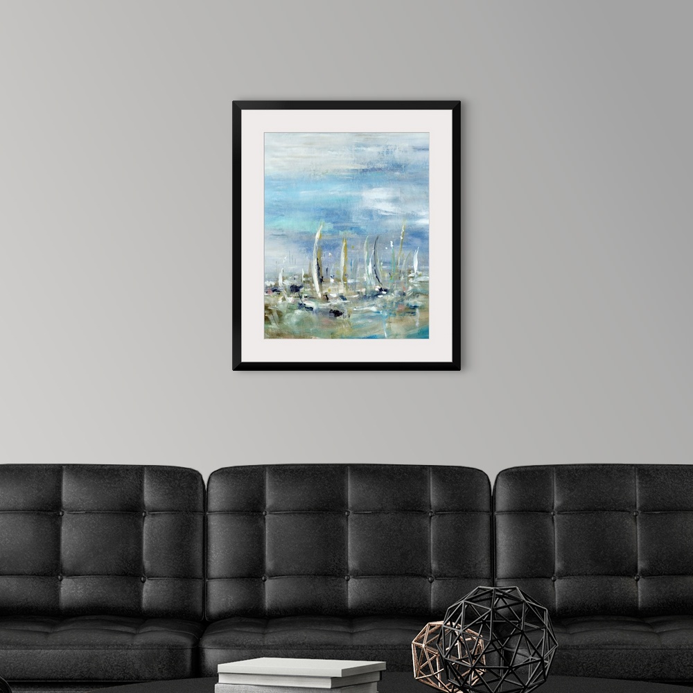 A modern room featuring Abstract painting of sailboats in the ocean on a cloudy day.  The boat shapes are created from va...