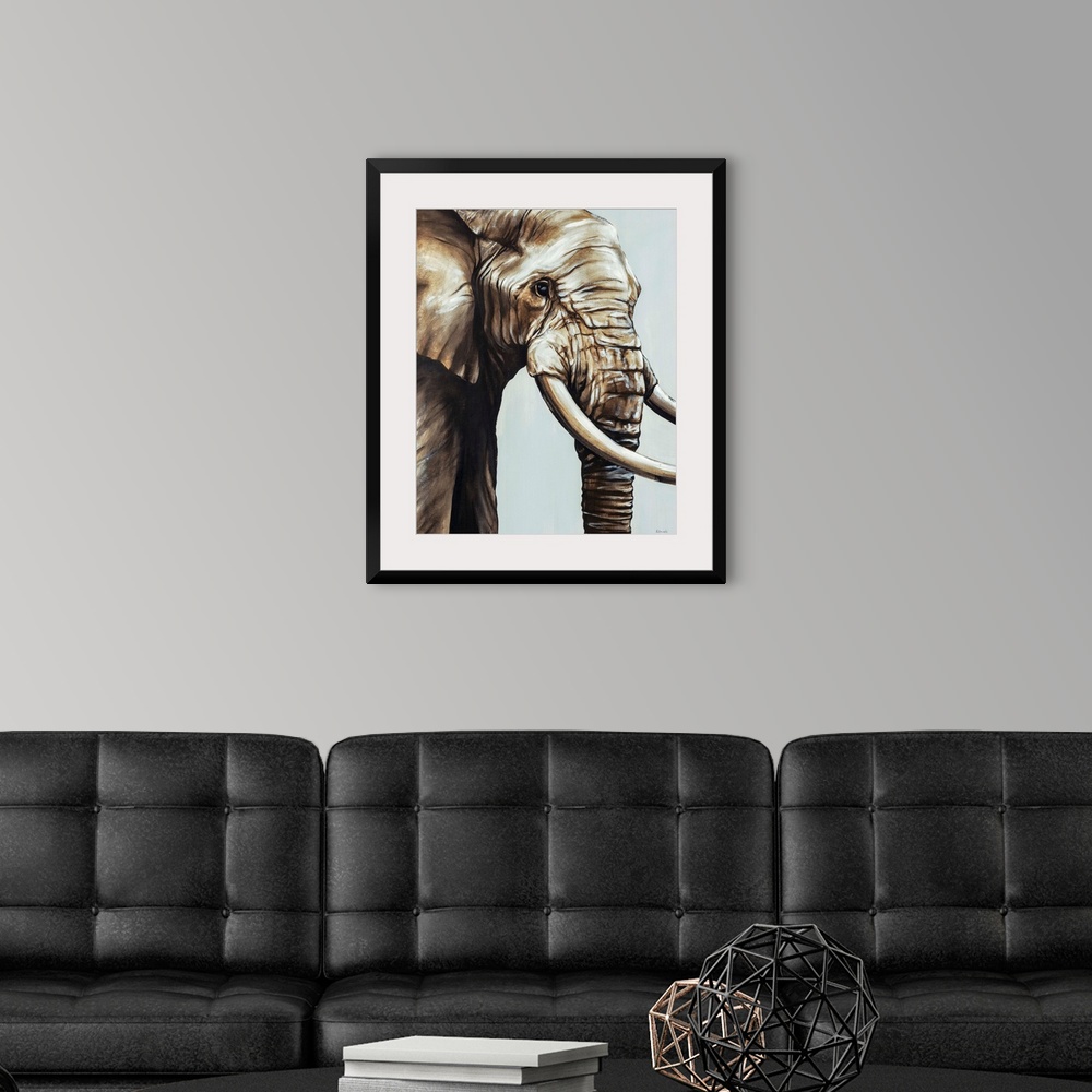 A modern room featuring Painted brown and gray portrait of an elephant.