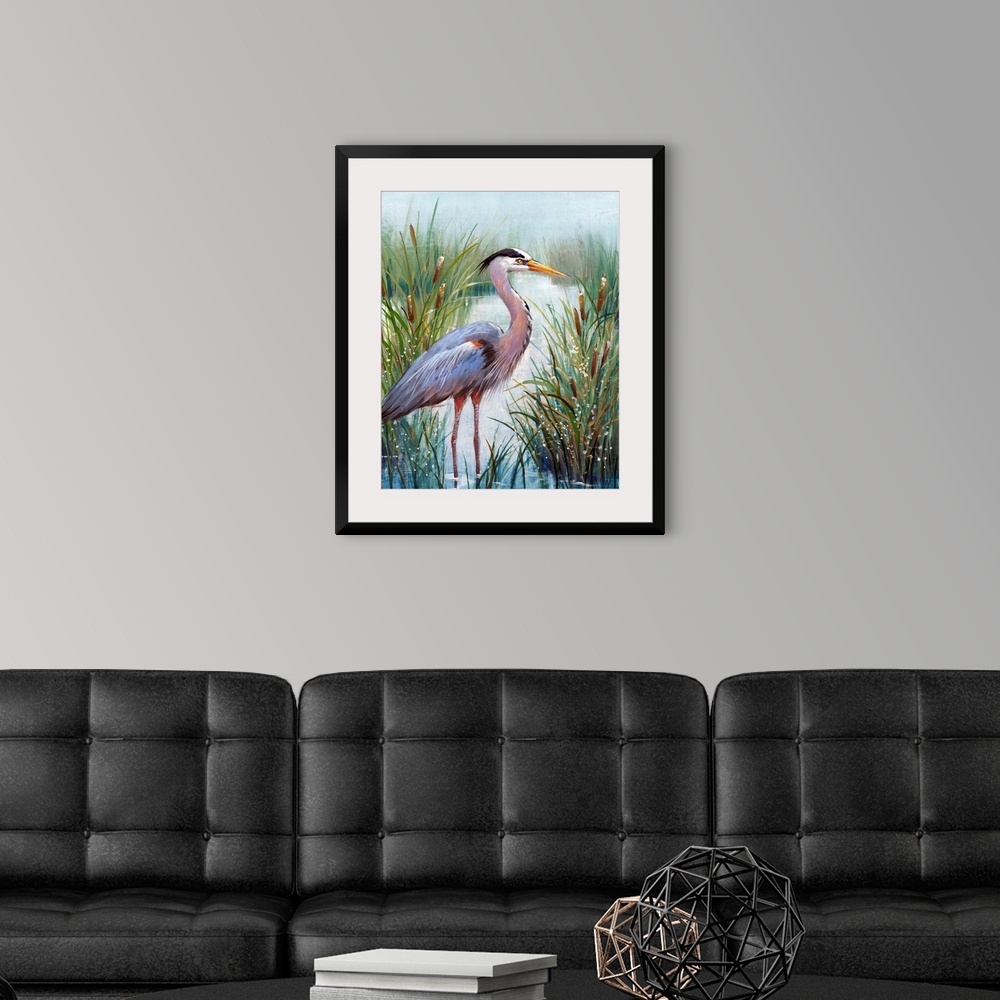 A modern room featuring In this contemporary artwork, a stoic heron wades in the water with tall grasses and cattails wor...