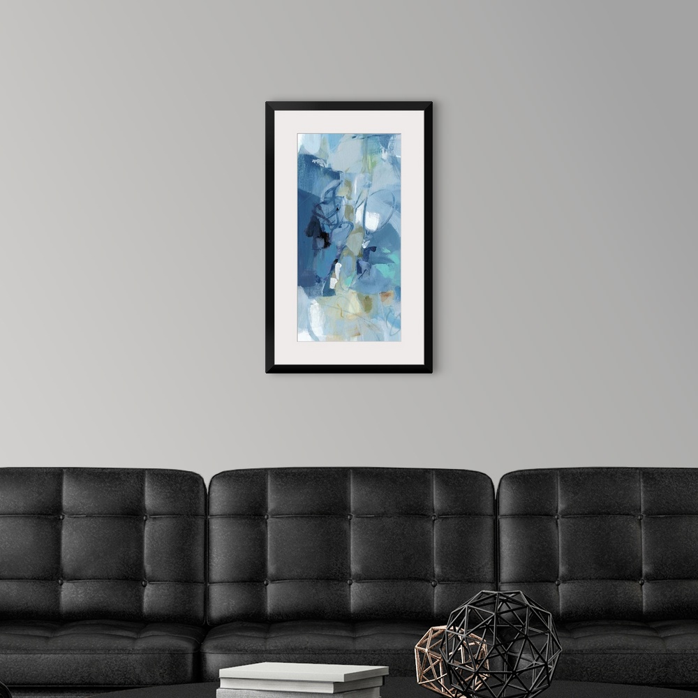 A modern room featuring Abstract painting using a variety of blue tones.