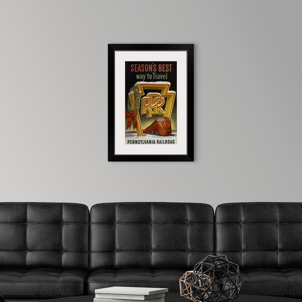 A modern room featuring Vintage travel poster of a red train passing through the keystone logo of the Pennsylvania Railro...