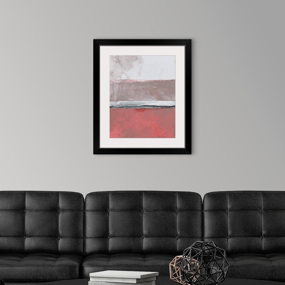 A modern room featuring Abstract color block artwork in shades of coral pink and pale grey.