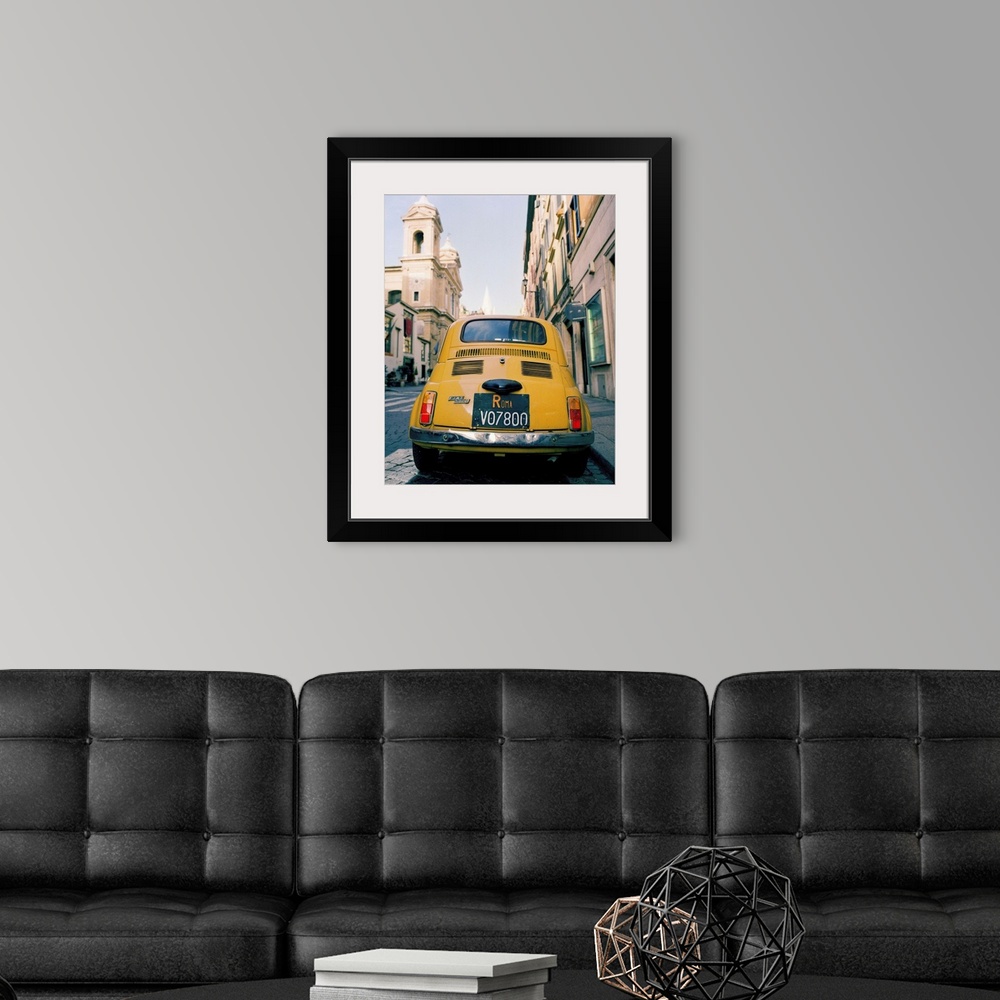 A modern room featuring Italy, Rome, yellow Fiat 500, via del Babuino, near Piazza Garibaldi