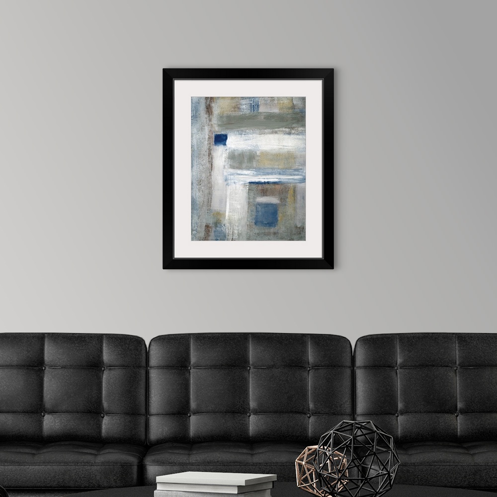 A modern room featuring Abstract painting of perpendicular brush strokes in colors of blue, white and gray.