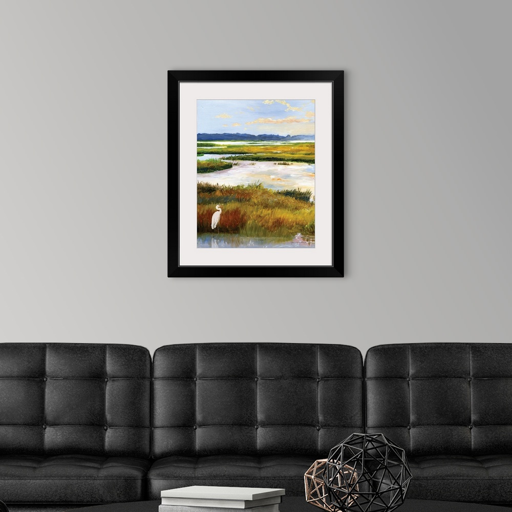 A modern room featuring A serene scene of water and grasses illuminated by the late afternoon sun. A white heron stands p...