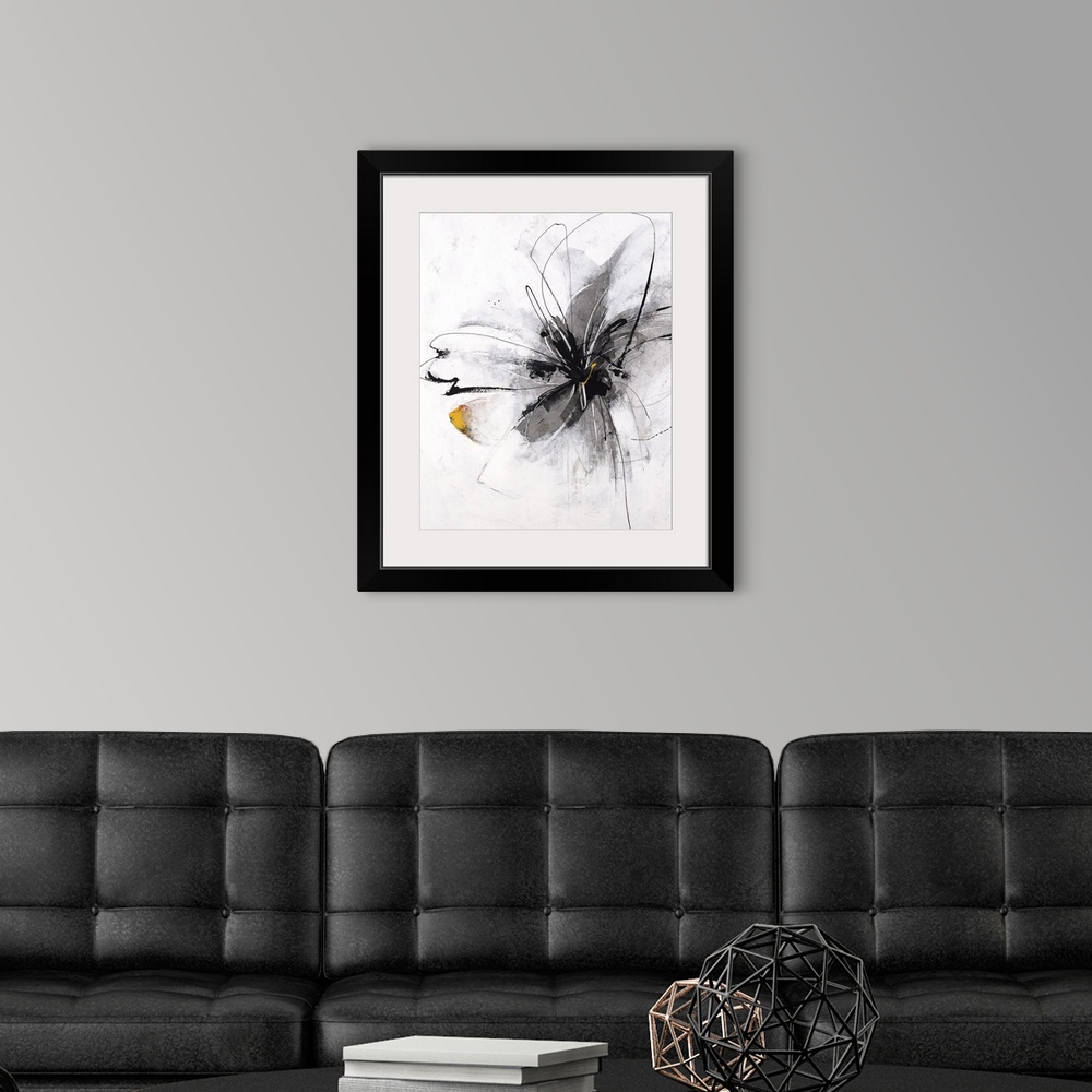 A modern room featuring Painting of a single flower in bloom in gray.