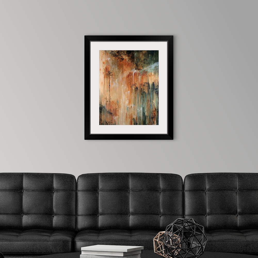 A modern room featuring Abstract painting of dark paint splashed and dripped on top of warm tones.