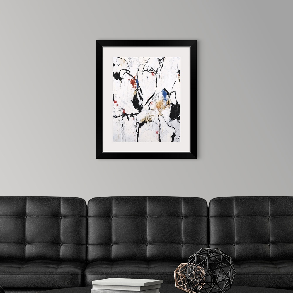 A modern room featuring Abstract artwork with bold, black lines and blotches of color on a white background with orange, ...