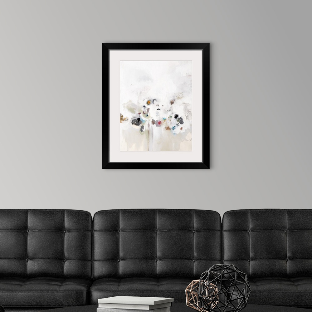A modern room featuring Contemporary artwork with small spots of color hiding in white.