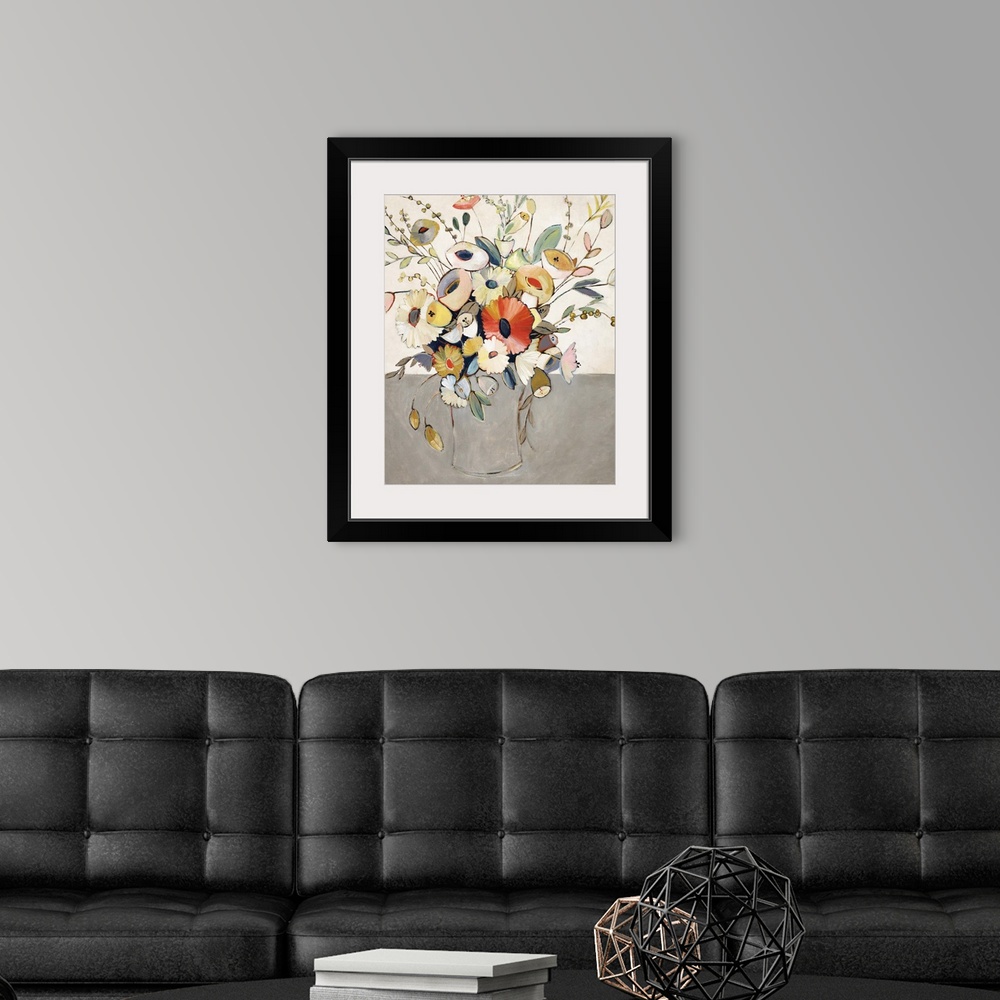 A modern room featuring A contemporary painting of a colorful bouquet of flowers.