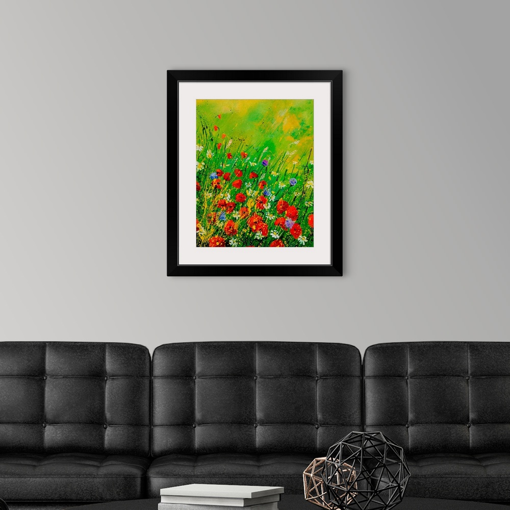 A modern room featuring Vertical painting of a field of red poppies along with other wild flowers in bloom.