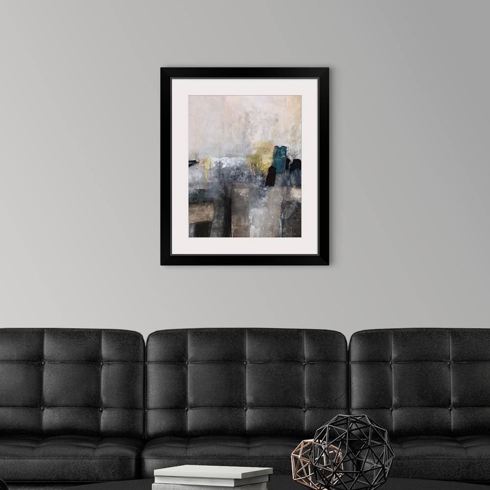 A modern room featuring Abstract painting done in soft, muted grays and browns with a hint of white and citron yellow.