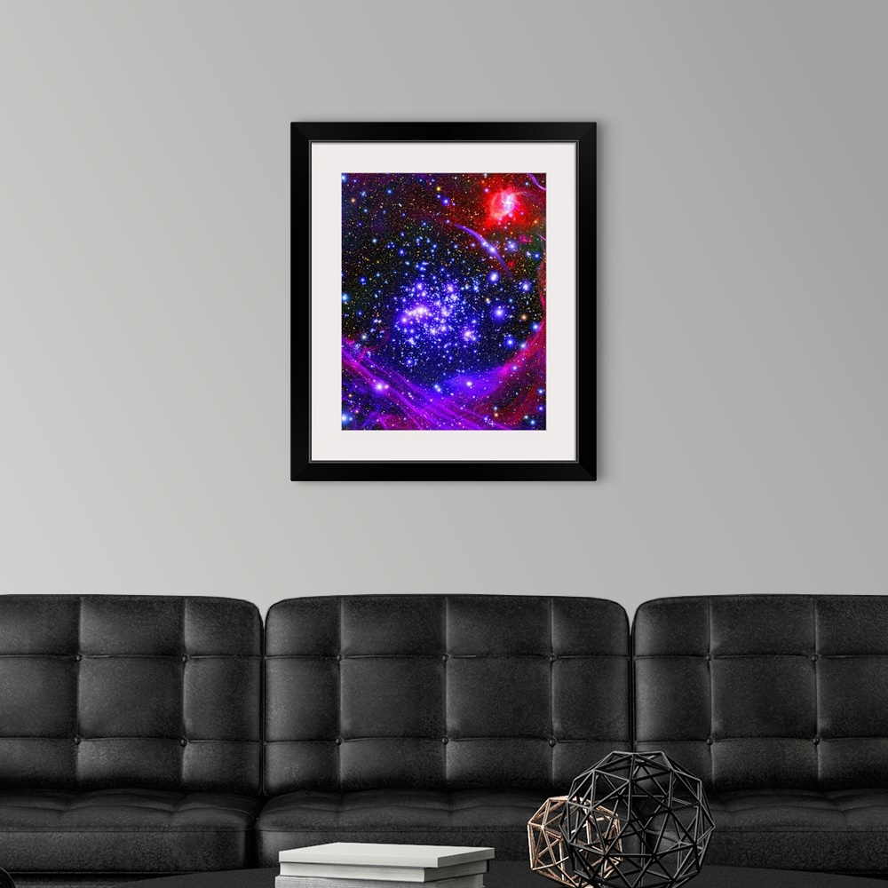 A modern room featuring Photograph of a starry sky with swirls and bands of color gases.