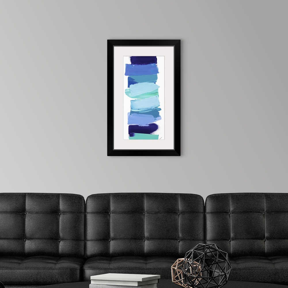 A modern room featuring Vertical contemporary painting of shades of blue stacked in a line.